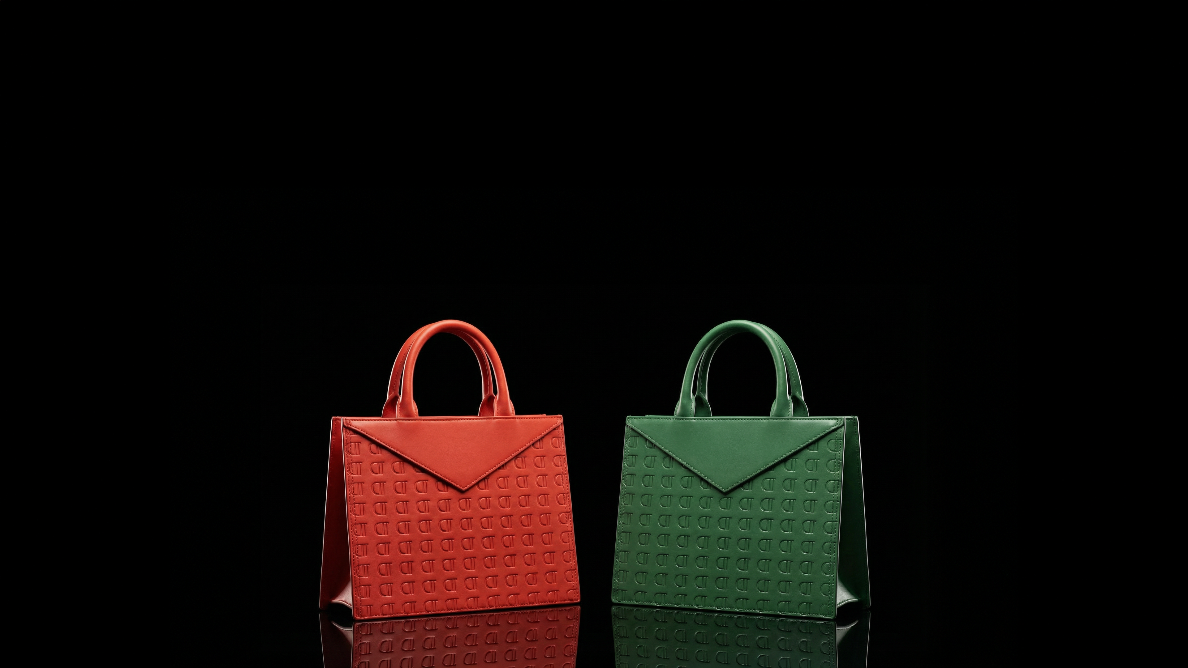 Two leather handbags, one red and one green, on a black background